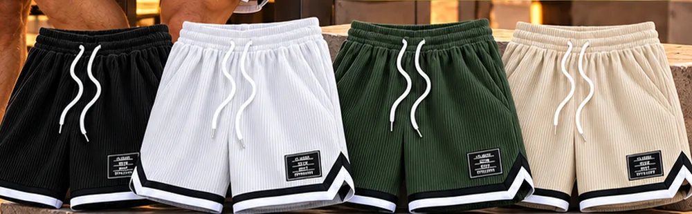 Las cuatro pantalonetas juntas: negro, blanco, verde militar y avena.